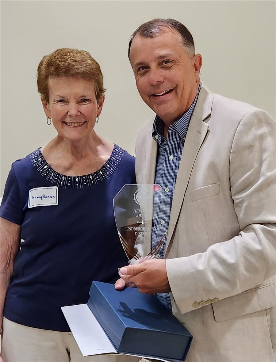  Dr. Tony Lake is presented the heritage award from Nancy Benson.